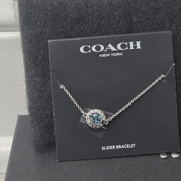 Coach Open Circle Silver Slider Bracelet with Blue Gem - Picture 1 of 2